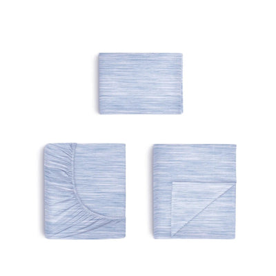 Three folded light blue striped bedding pieces arranged on a white background, including a flat sheet, a fitted sheet, and a pillowcase.