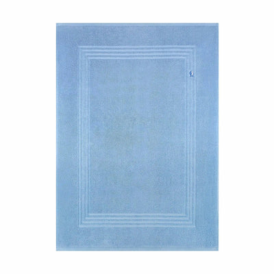 A blue bath mat, shown flat against a plain white background.