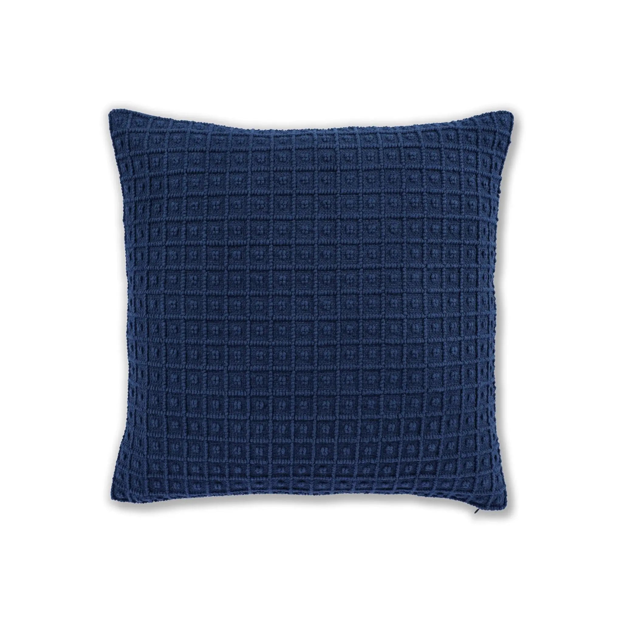 A square navy blue throw pillow with a textured waffle grid pattern, shown against a plain white background.
