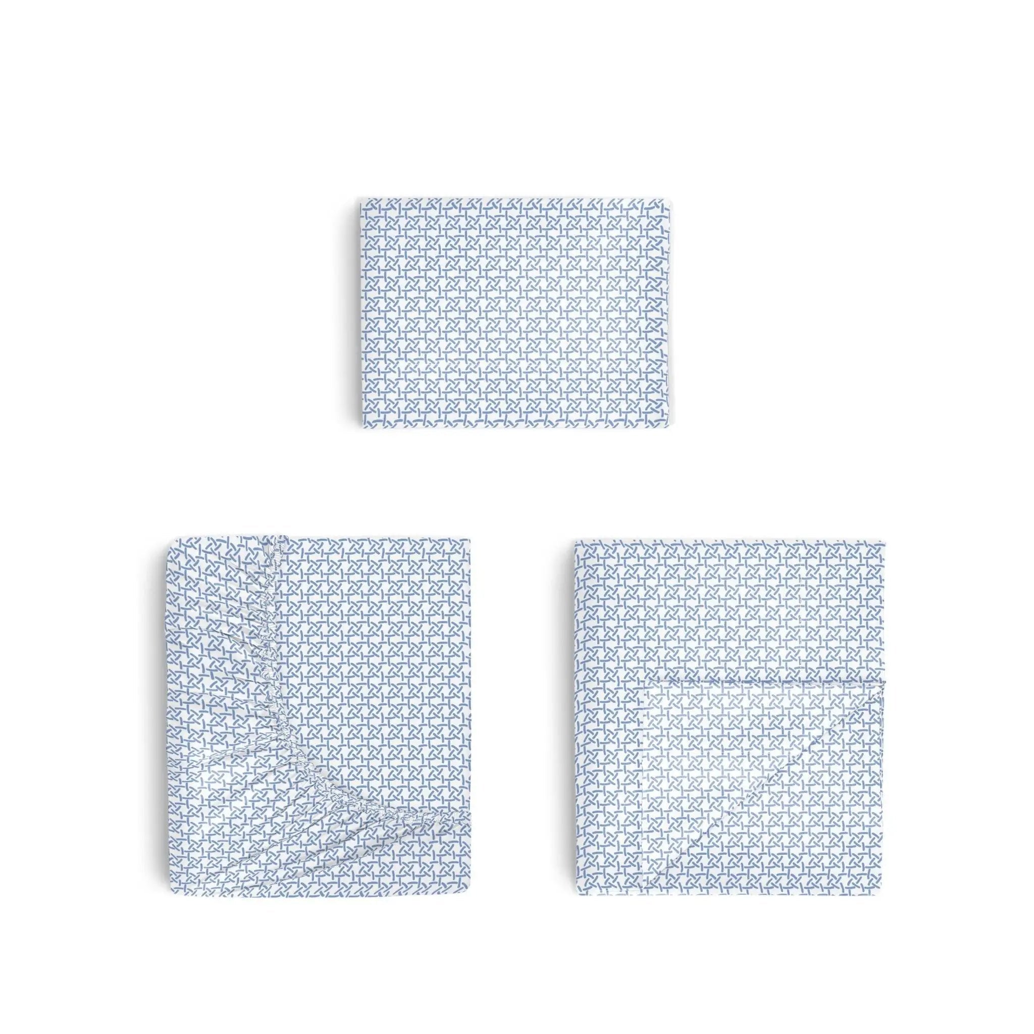 Three blue geometric patterned sheets on a white background