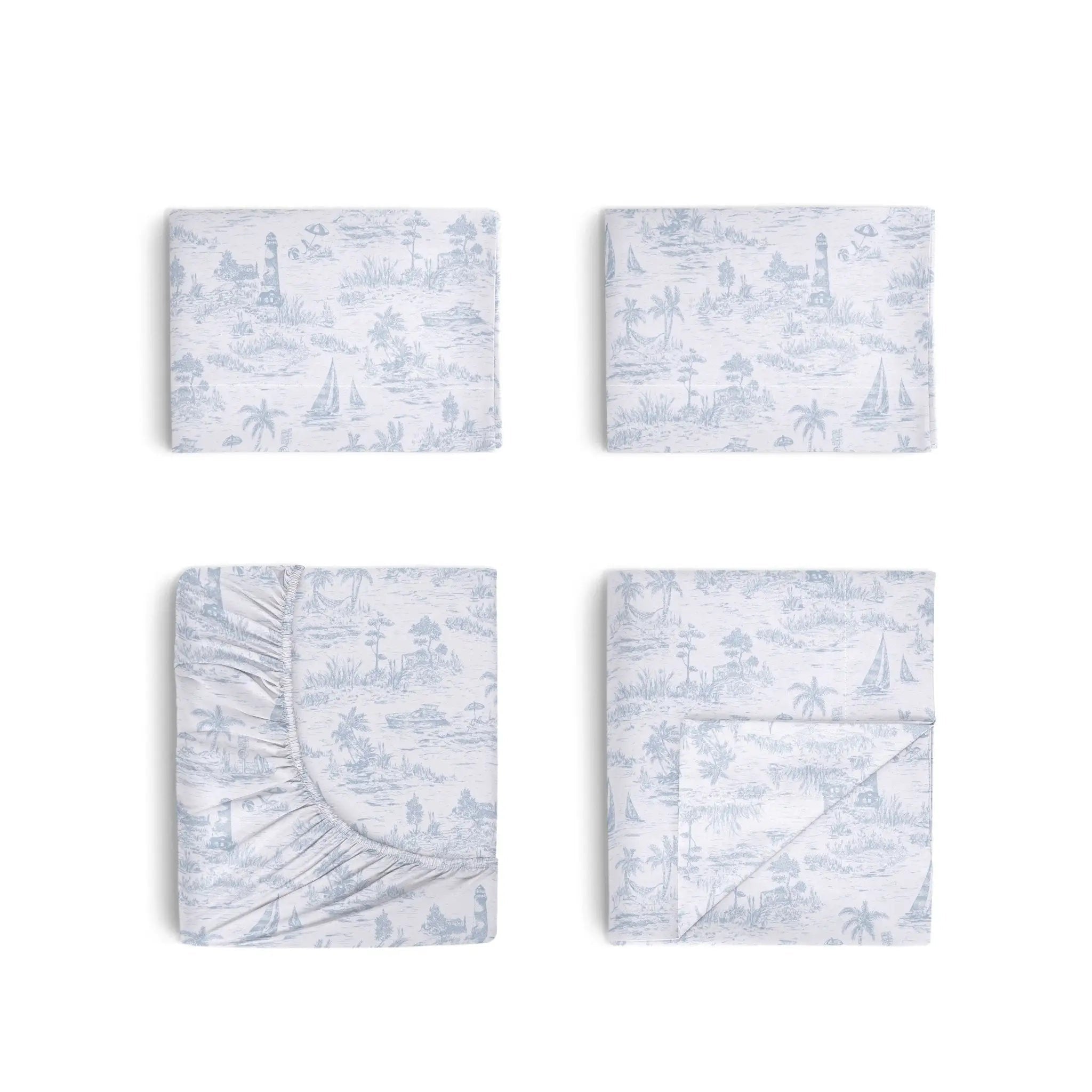 Set of four blue and white patterned bed sheets on a white background