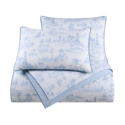 Blue and white patterned comforter set with two pillow shams on a white background