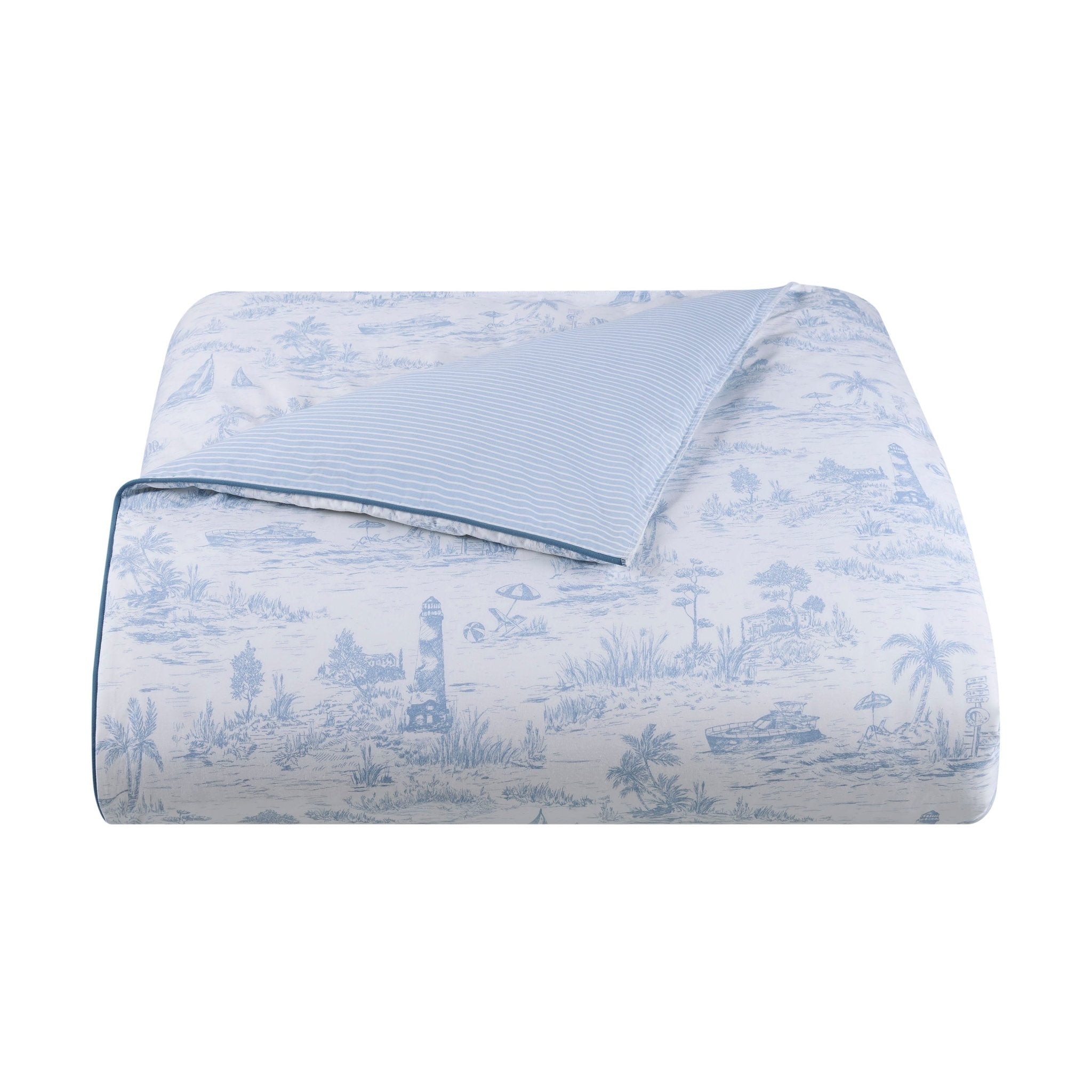 Blue patterned comforter on a white background