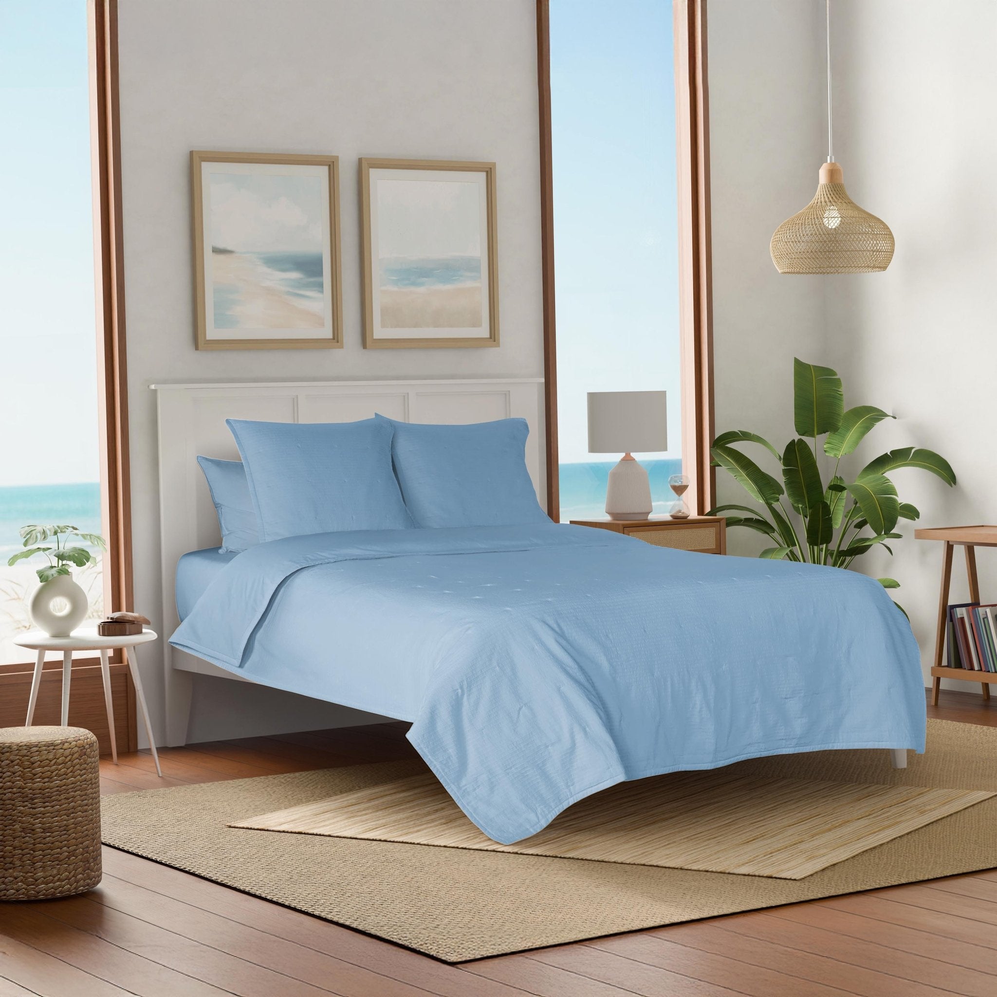Bedroom with light blue bedding.