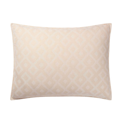 Beige pillow sham with a subtle pattern on a white background