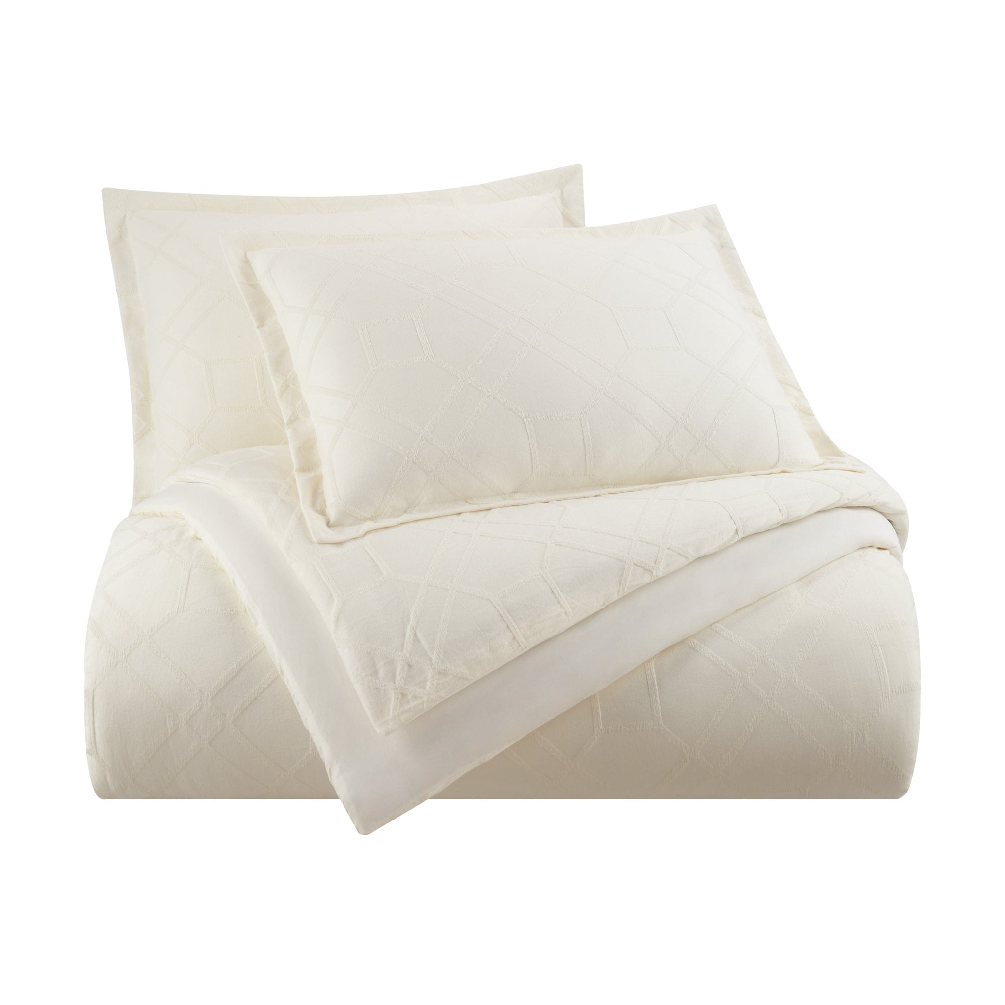 Ivory comforter and pillow shams on a white background
