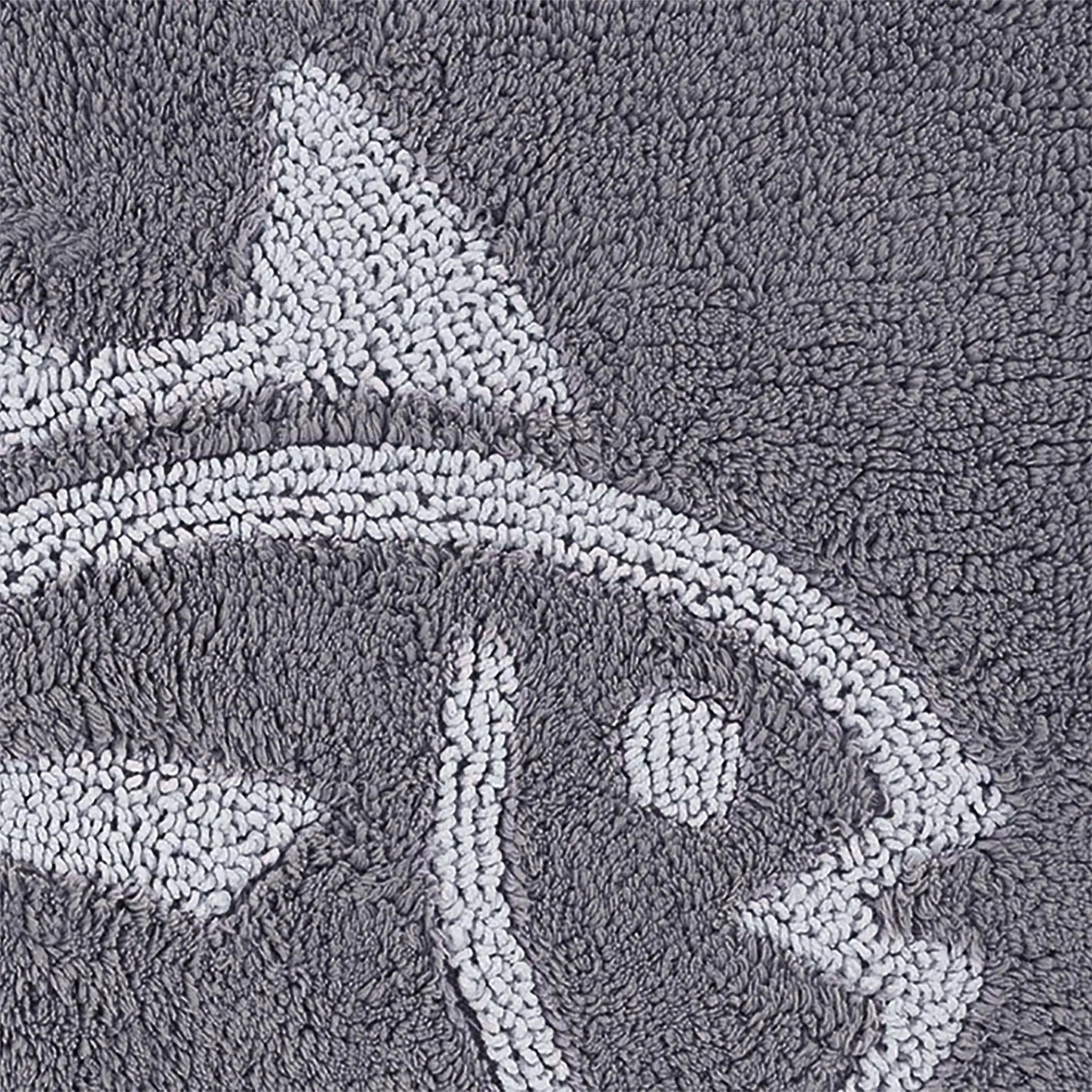 Gray bath rug with a fish design