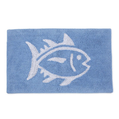 Light Blue bath rug with white fish design on a white background