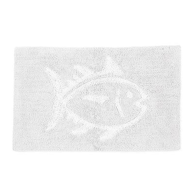 A white textured bath rug featuring a raised fish motif in the center, shown against a plain white background.
