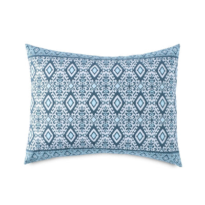 Blue patterned pillow sham on a white background