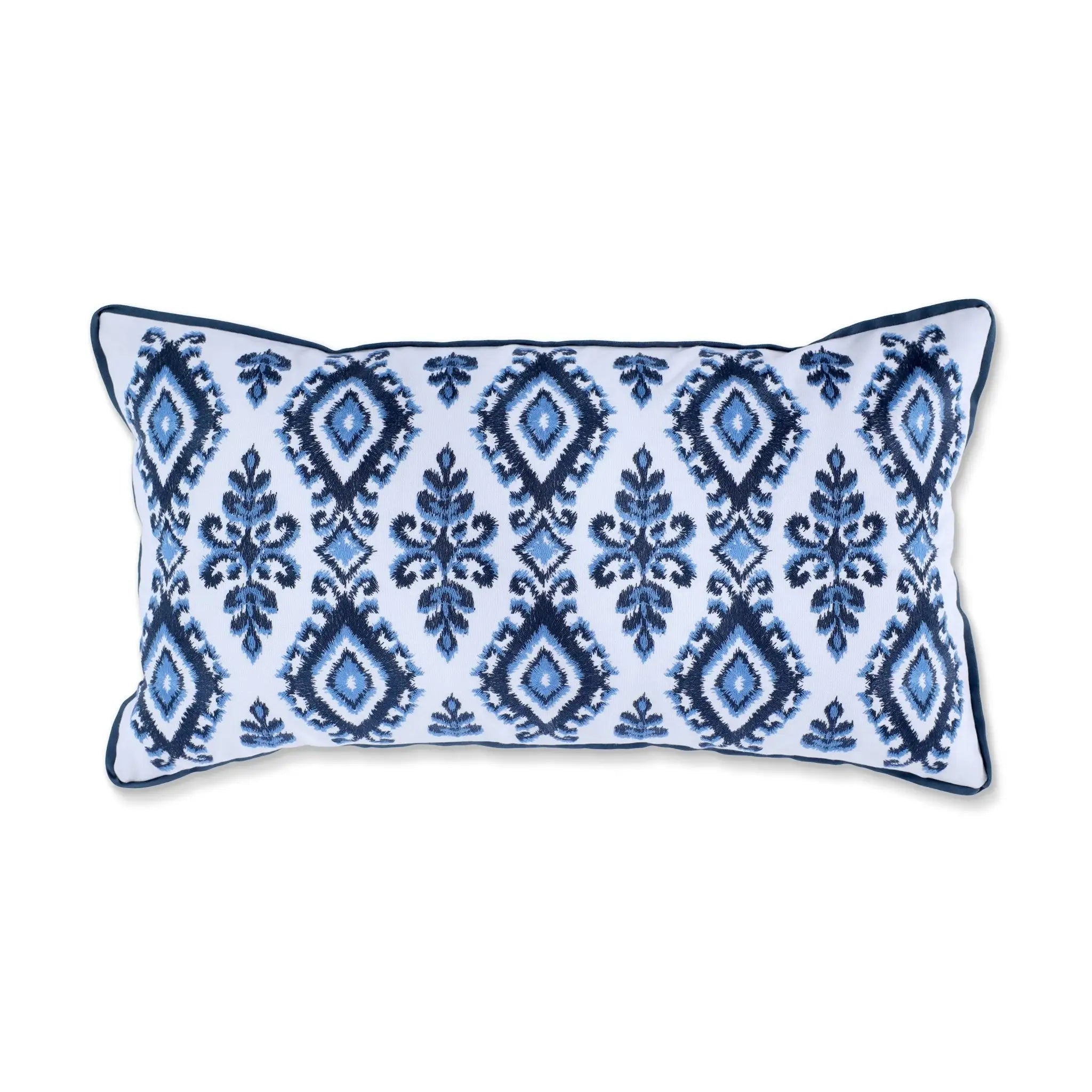 Decorative pillow with blue geometric pattern on white background