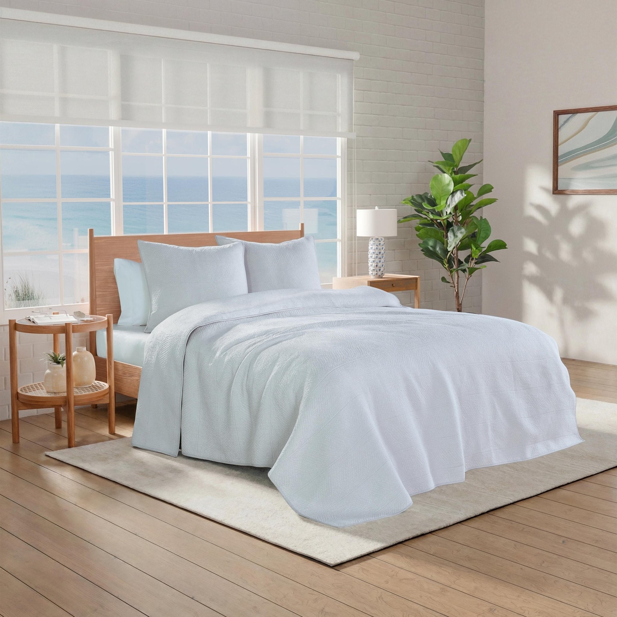 Bedroom with light blue bedding.