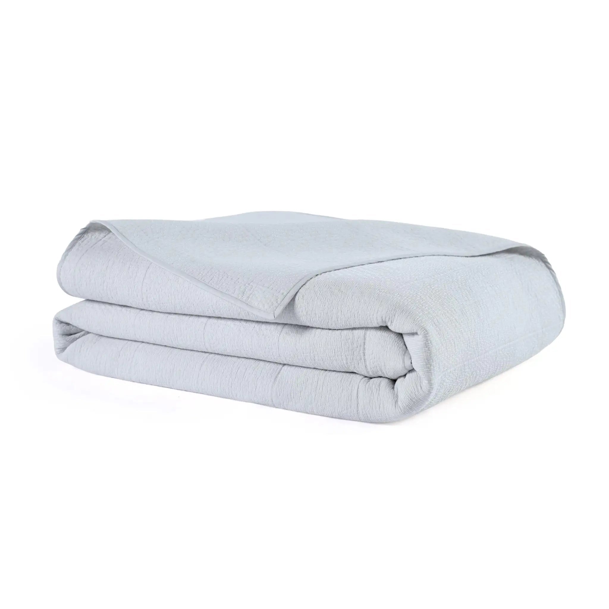 Gray quilt on a white background.