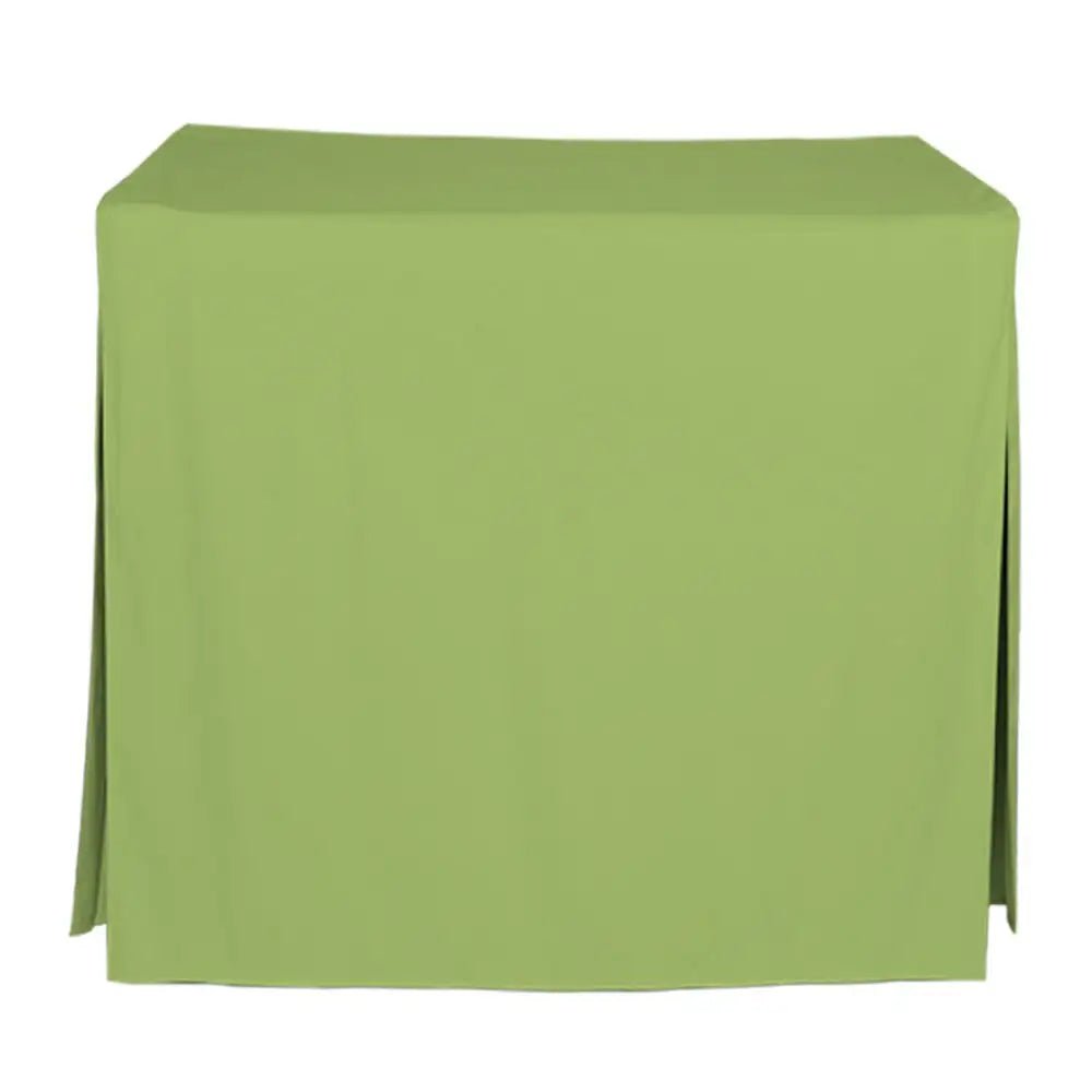 A solid light green tablecloth draped over a rectangular table, shown against a plain white background.