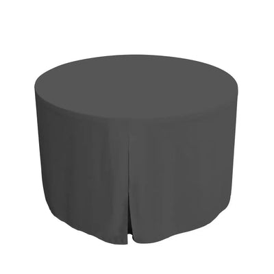 Round table covered with a charcoal tablecloth on a white background