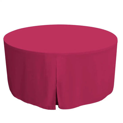 A round table covered with a solid pink tablecloth, shown against a plain white background.