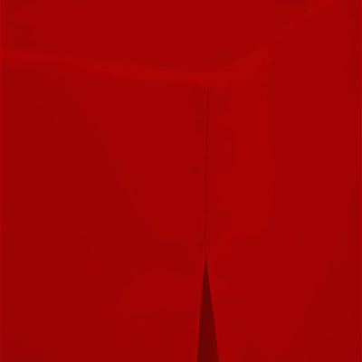A close-up of a solid deep red table cover with a subtle vertical seam and a small pointed fold near the bottom center.