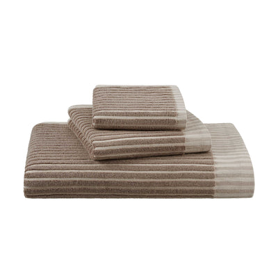 Four towels in varying sizes with a sculpted stripe design in shades of brown and beige.