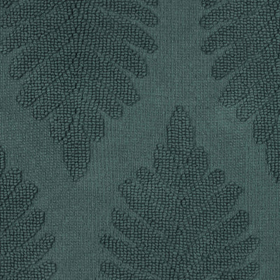 Textured bath rug featuring a fern pattern in shades of green.