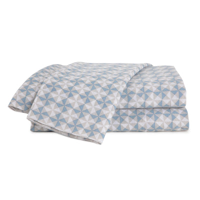 Soft blue sheet set featuring a geometric triangle pattern in light and dark shades.
