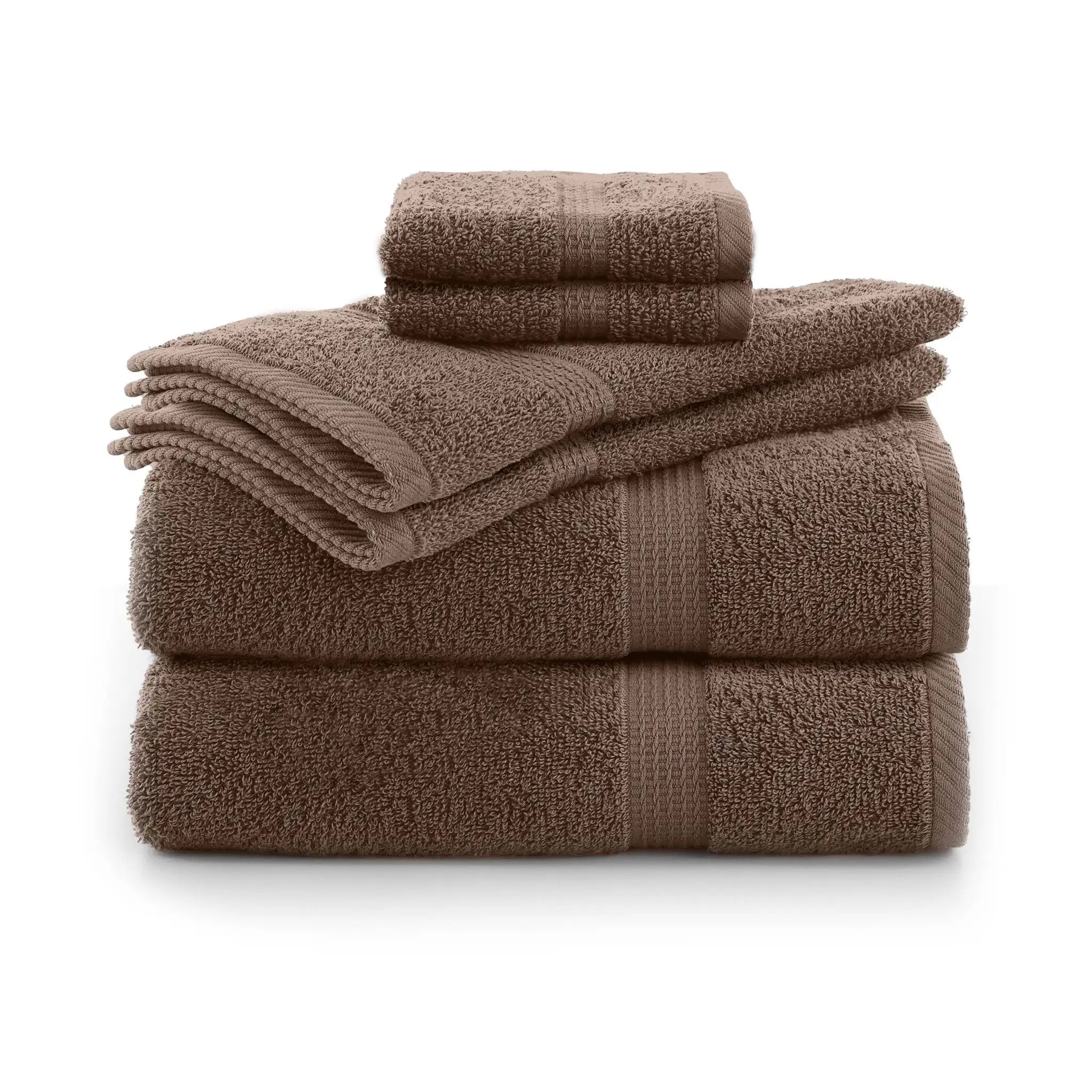 Stack of brown towel set on a white background