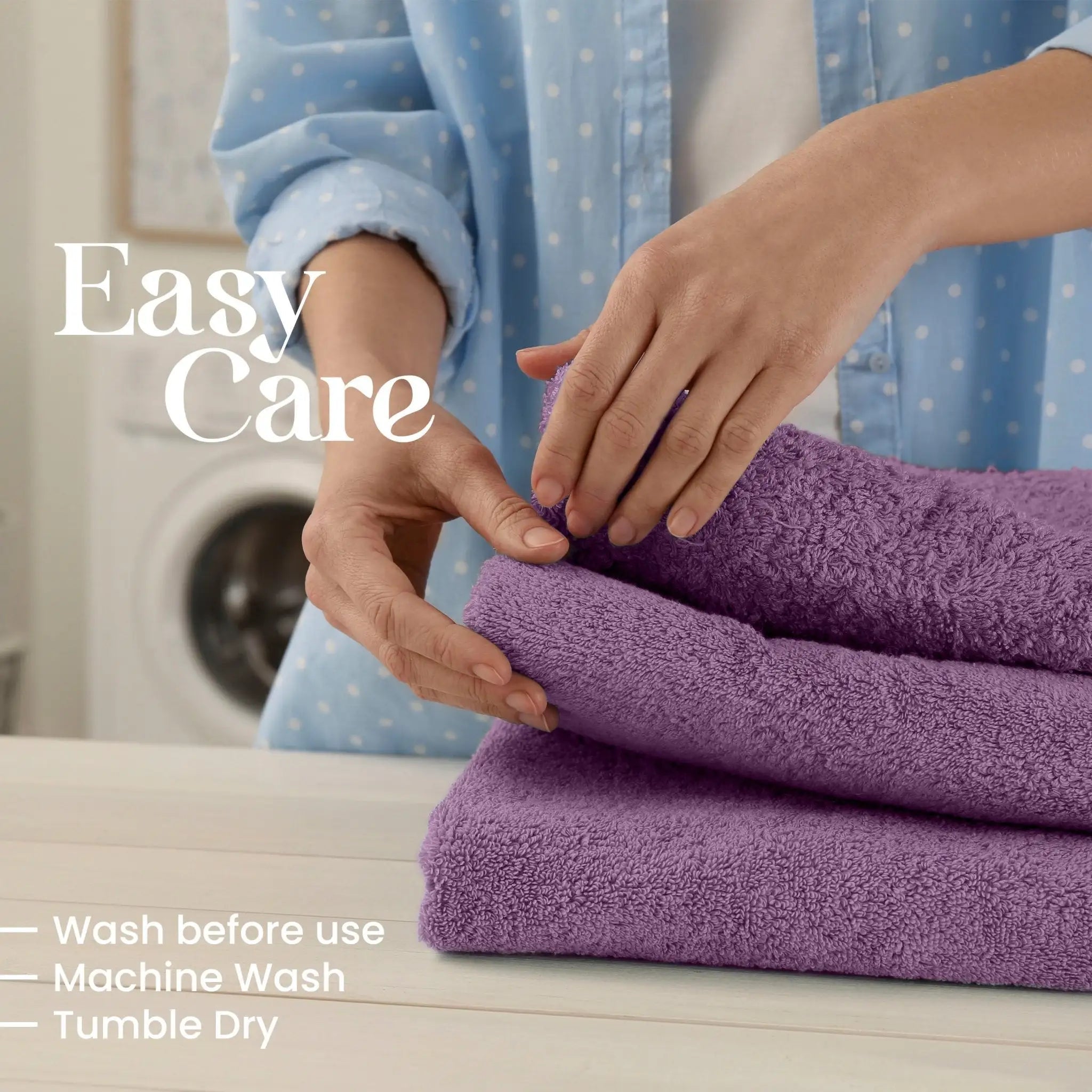 Person folding purple towels with washing machine in the background, text indicating care instructions.