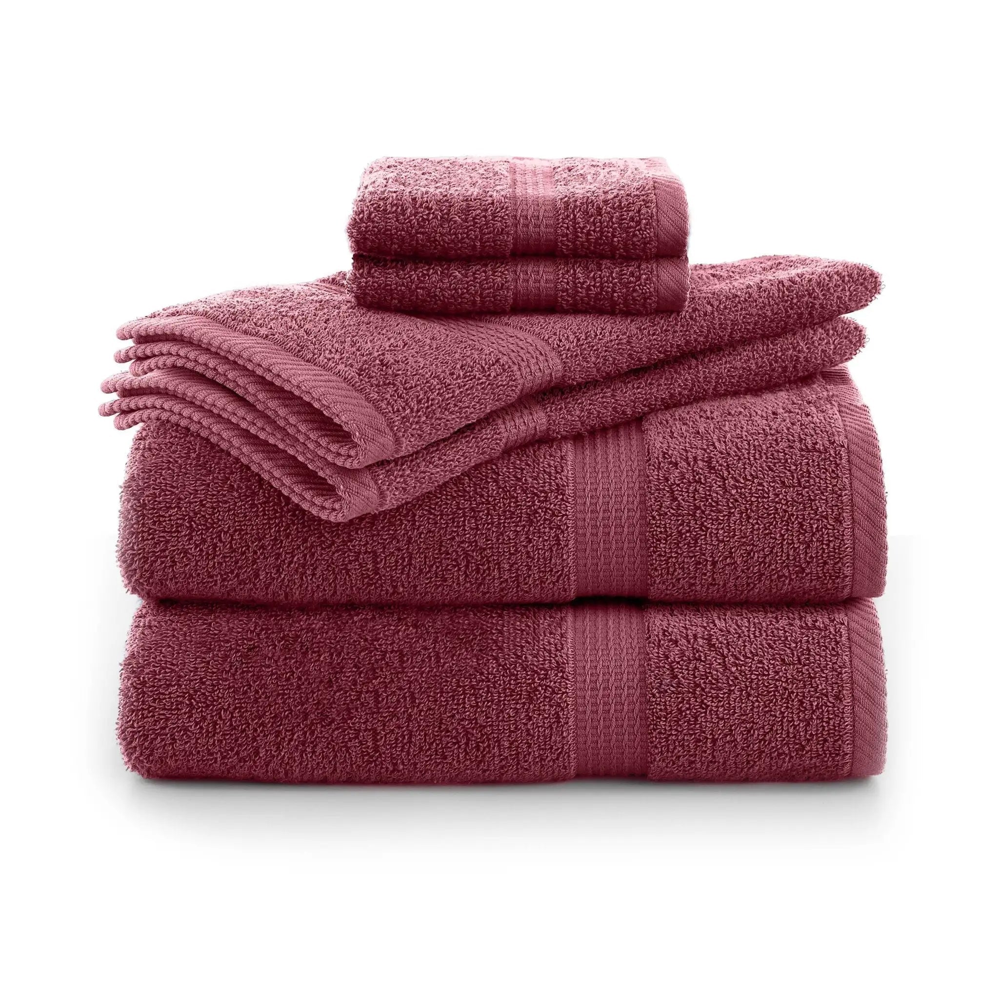 Stack of soft red towel set on a white background