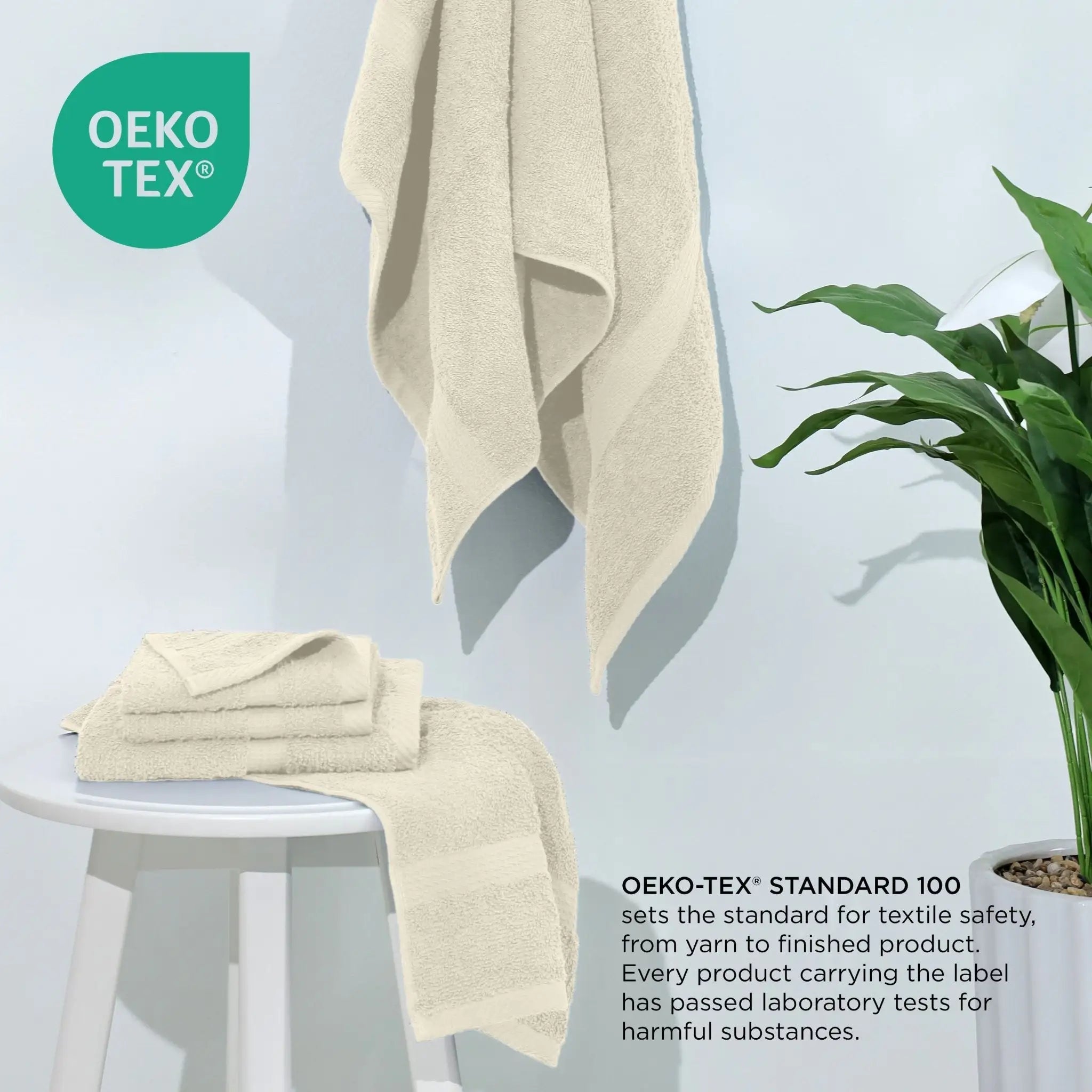 Ecru towel on a white chair with a plant, featuring the Oeko-Tex logo.