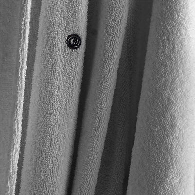 Gray terry bath robe with low lint texture and a small embroidered logo.