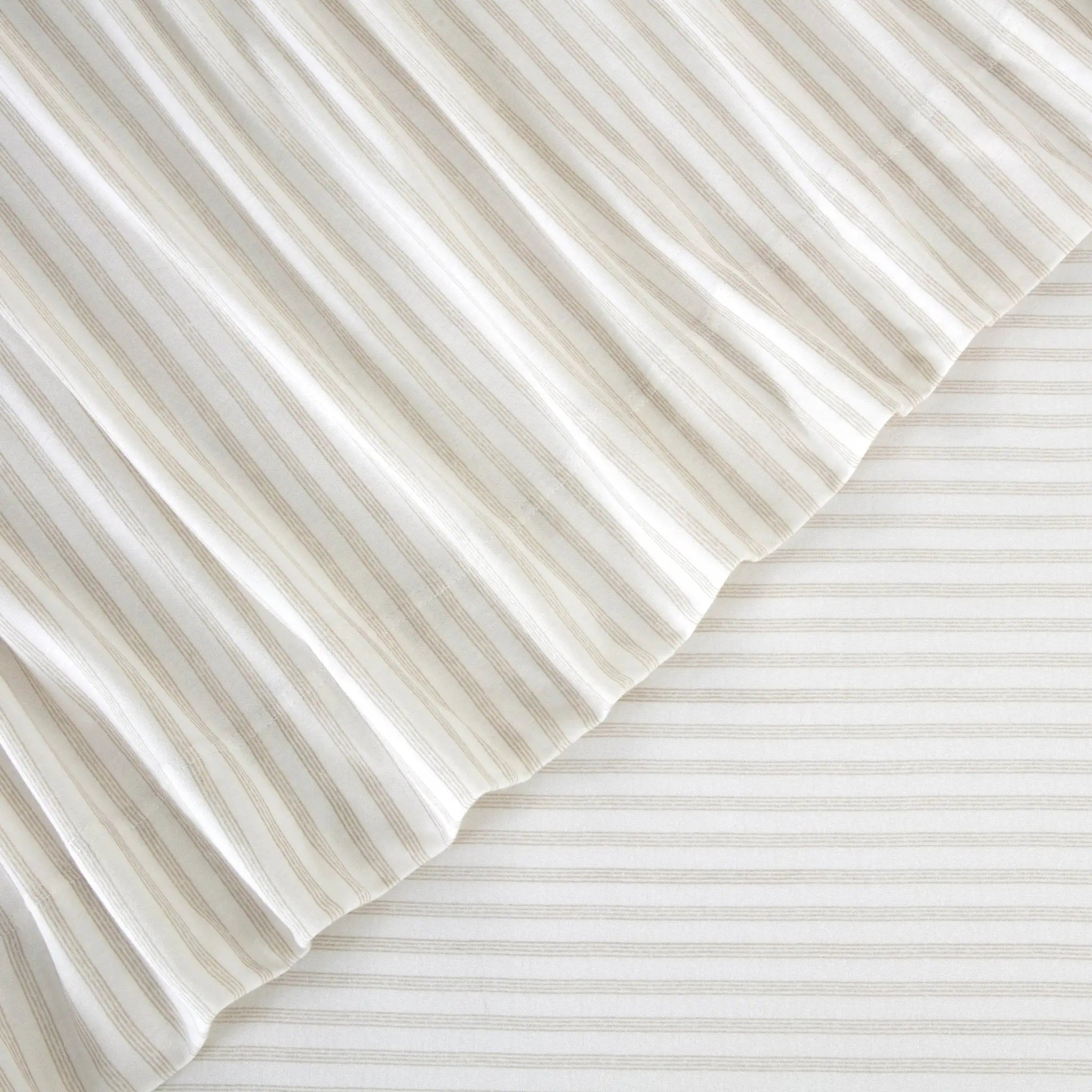 Close-up of white and beige striped fabric