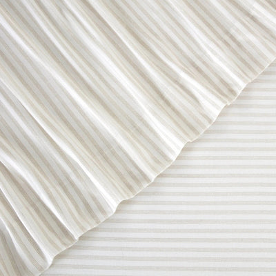 Close-up of white and beige striped fabric