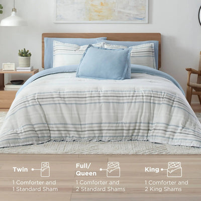Blue and white striped bedding set on a bed with size indicators below.