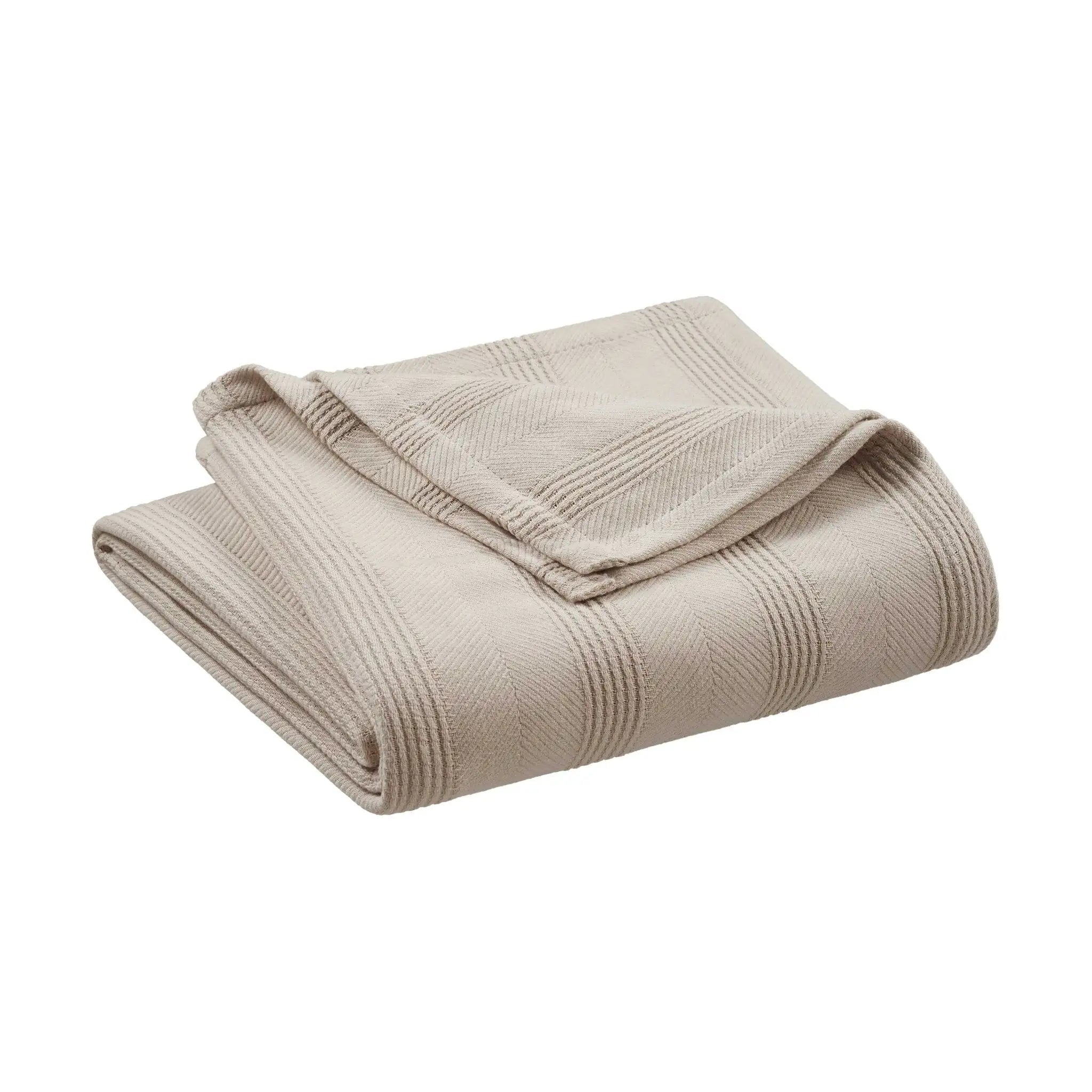 Folded mink blanket on a white background