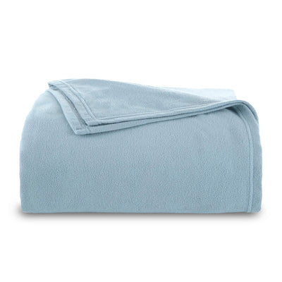 A folded light blue fleece blanket with a soft, plush texture, presented on a clean white background.