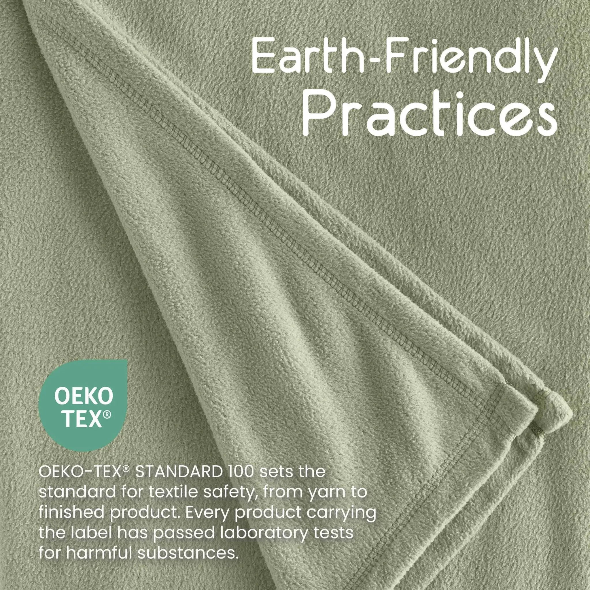 A close-up of a soft, textured fabric in a muted sage green color. White text overlays read 'Earth-Friendly Practices' and 'Oeko-TEX Standard 100 sets the standard for textile safety, from yarn to finished product.