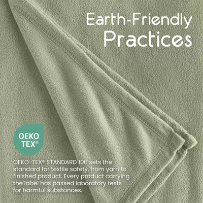 A close-up of a soft, textured fabric in a muted sage green color. White text overlays read 'Earth-Friendly Practices' and 'Oeko-TEX Standard 100 sets the standard for textile safety, from yarn to finished product.