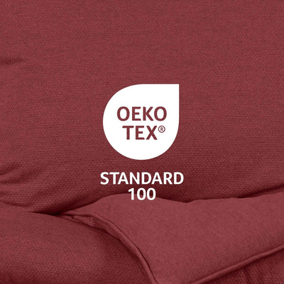 OEKO-TEX Standard 100 logo on a red fabric background