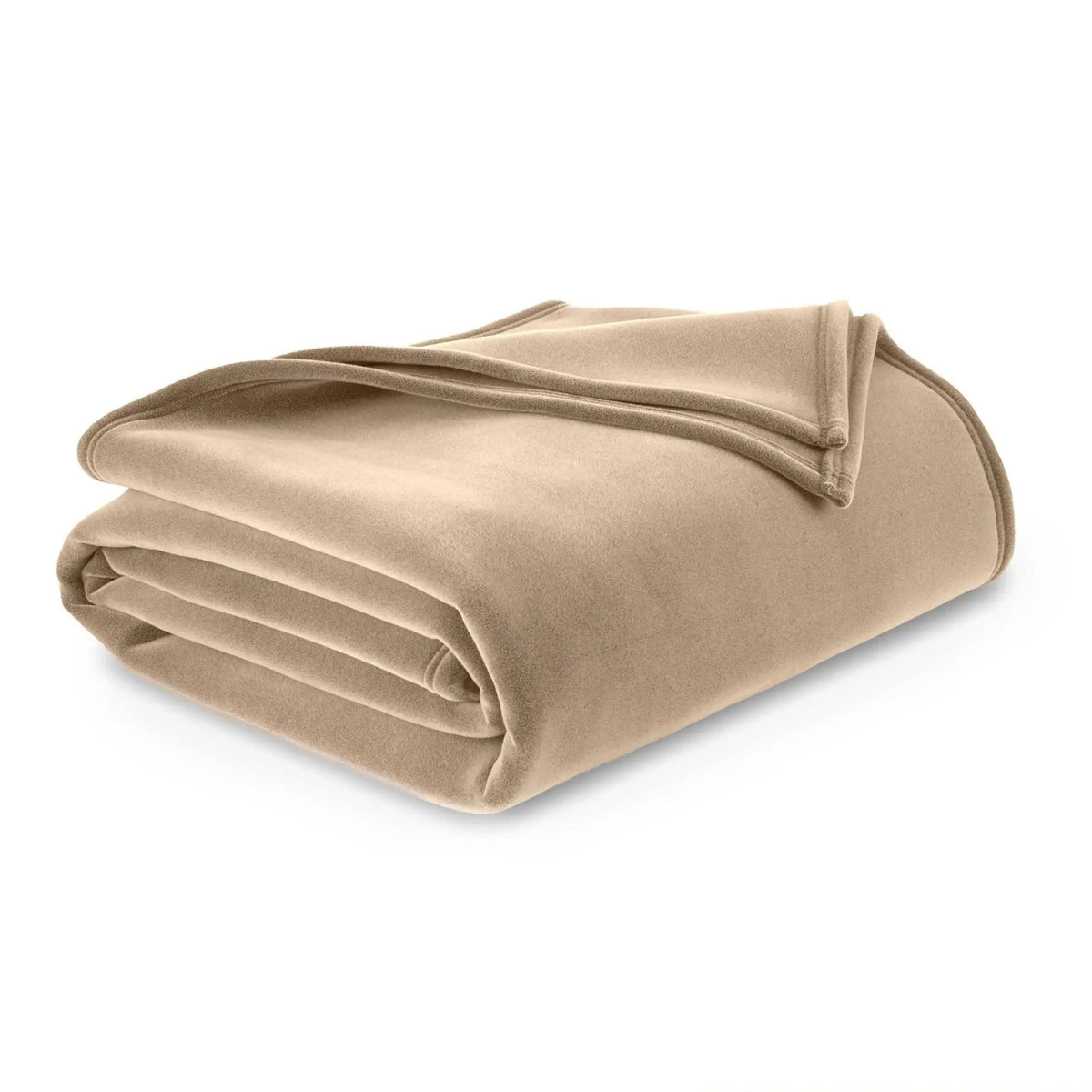 Folded beige blanket on a white background