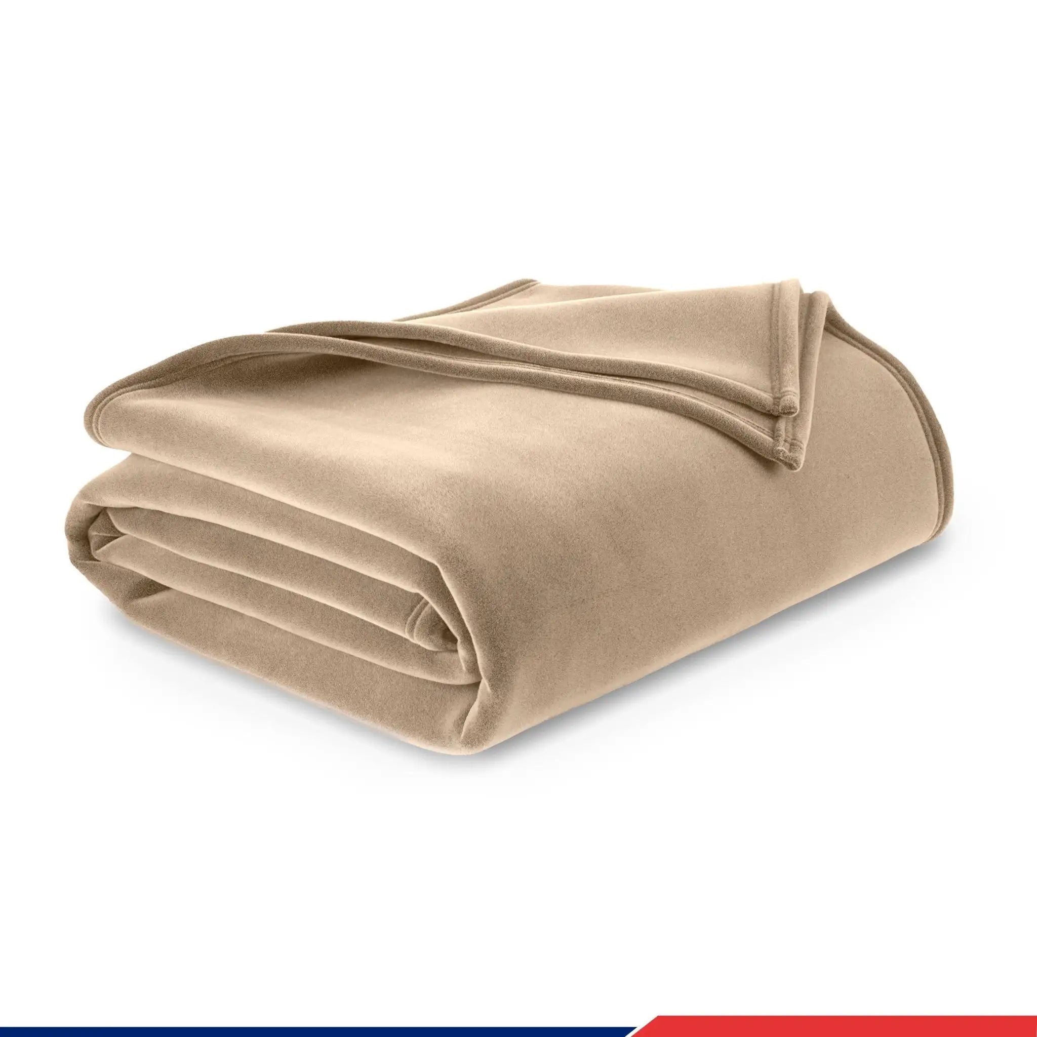 Folded beige blanket on a white background