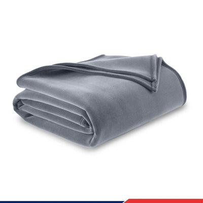 Folded gray blanket on a white background