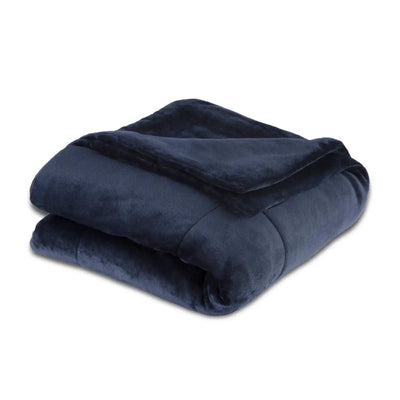 Folded blue blanket on a white background