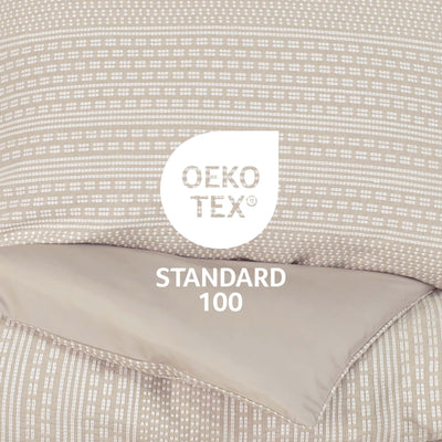 Textile product with OEKO-TEX Standard 100 label on a textured fabric background