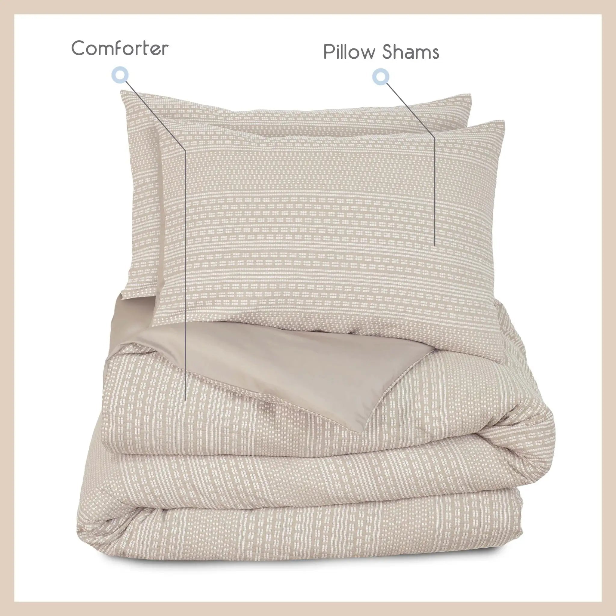 Beige comforter set with two pillow shams on a light beige background