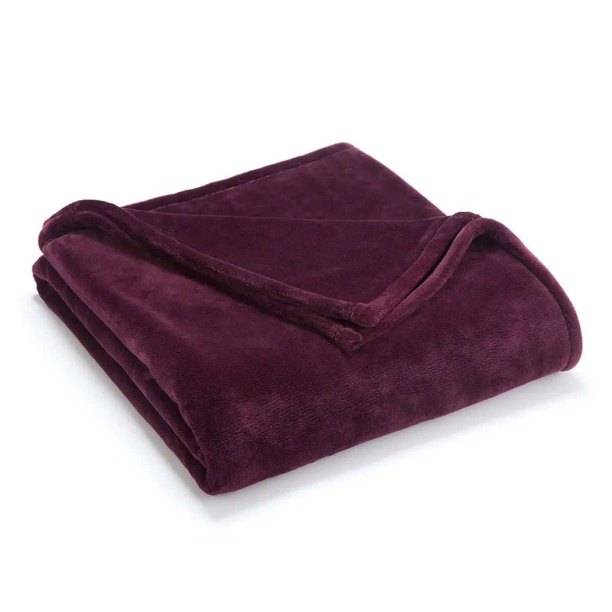 Folded fig colored blanket on a white background