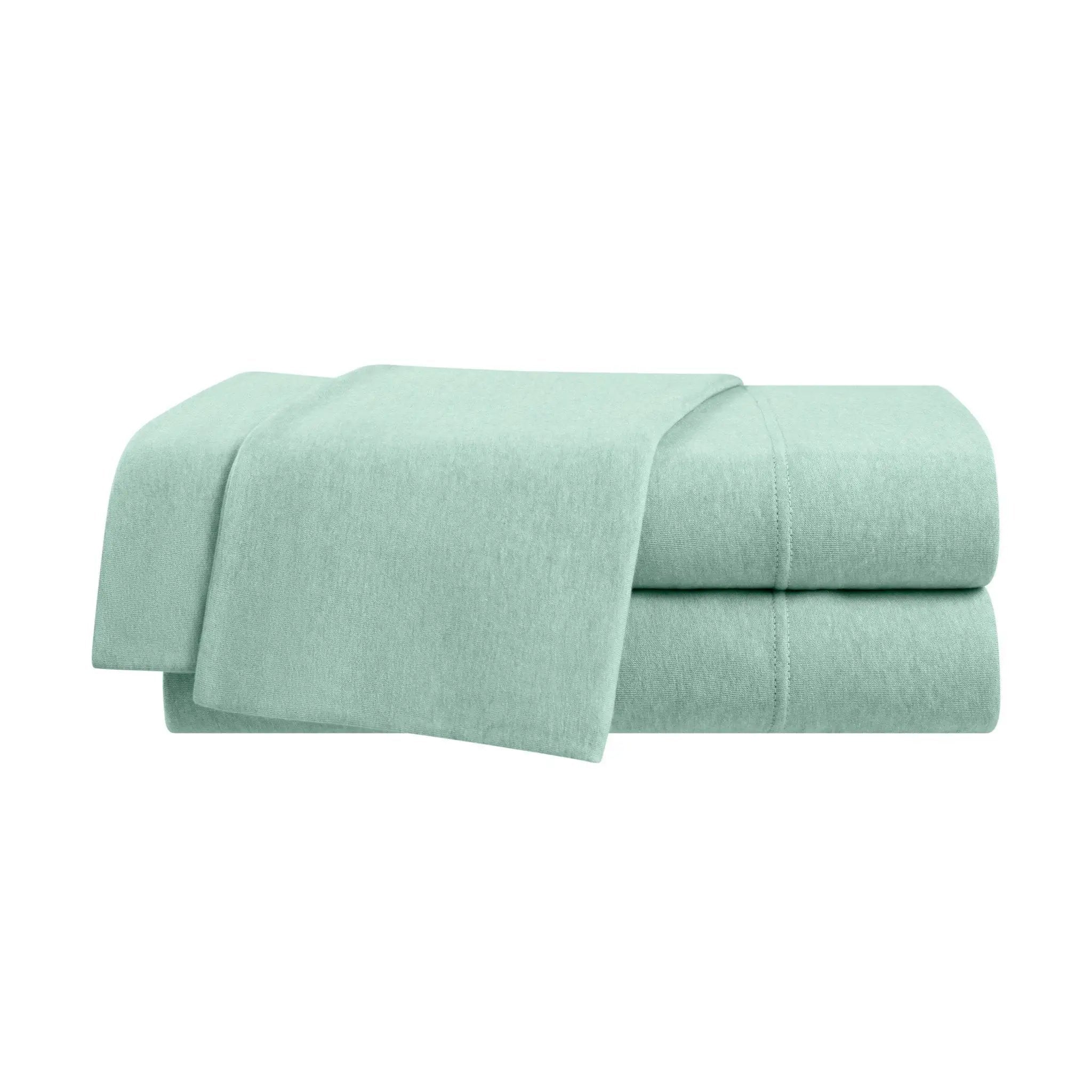 Stack of light green sheets on a white background