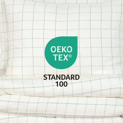 OEKO-TEX Standard 100 logo on a quilted fabric background
