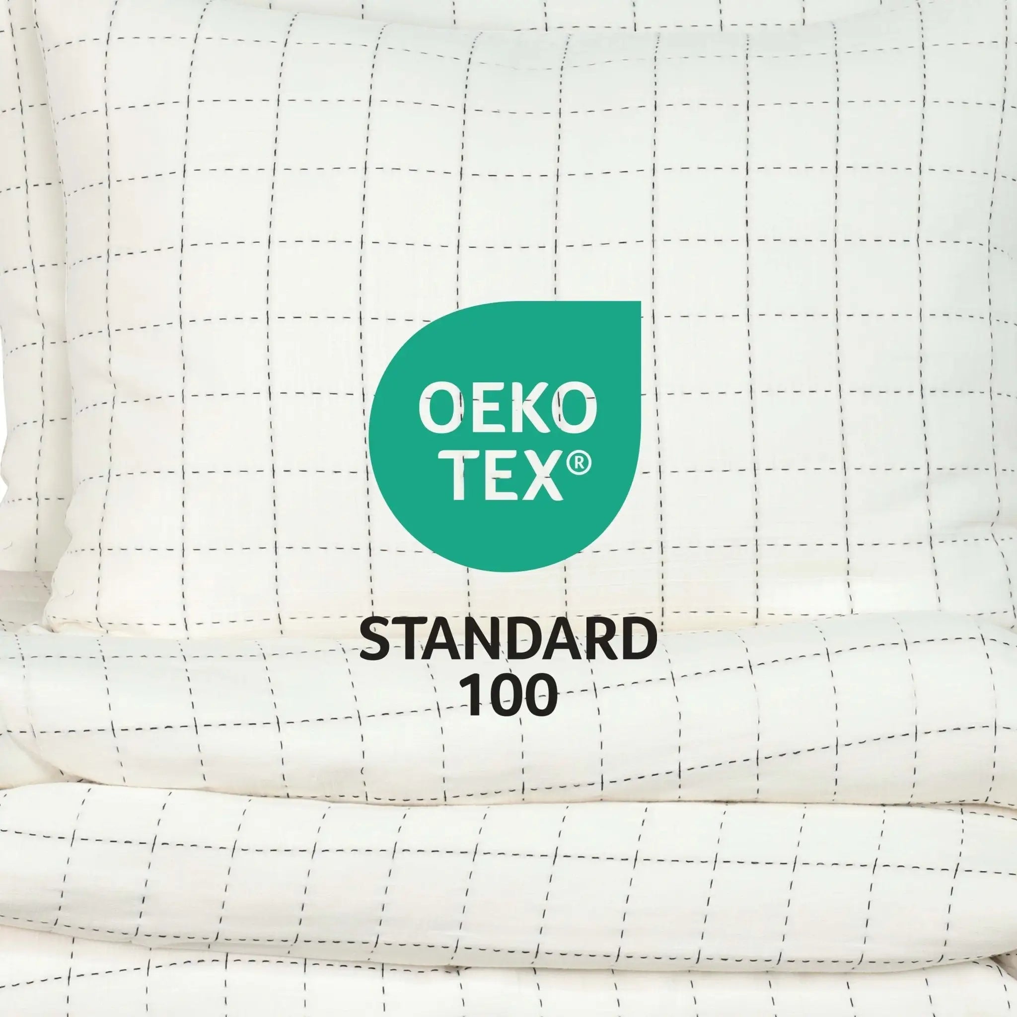 OEKO-TEX Standard 100 logo on a quilted fabric background