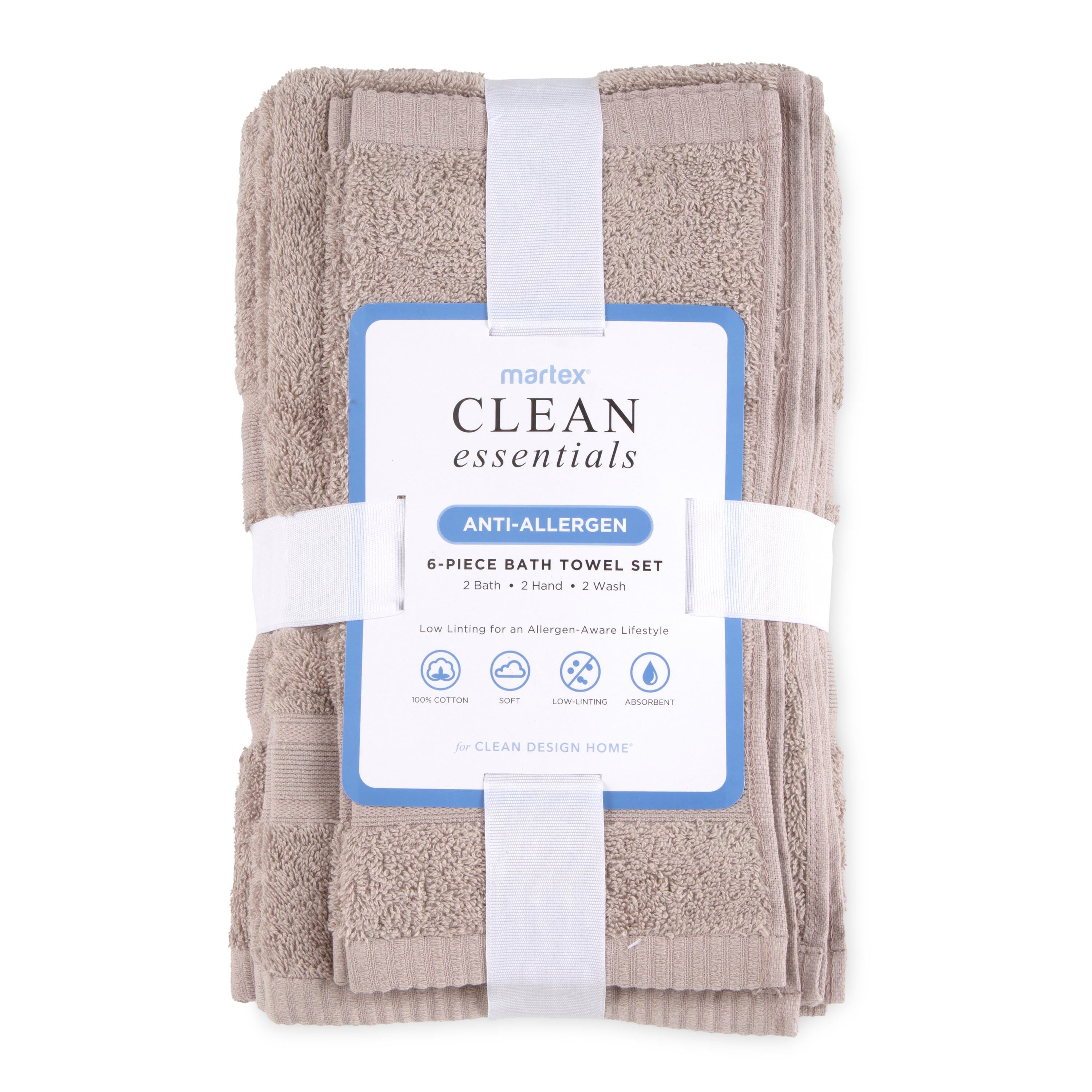 Six-piece towel set in beige, includes two bath towels, two hand towels, and two washcloths, packaged with a label.