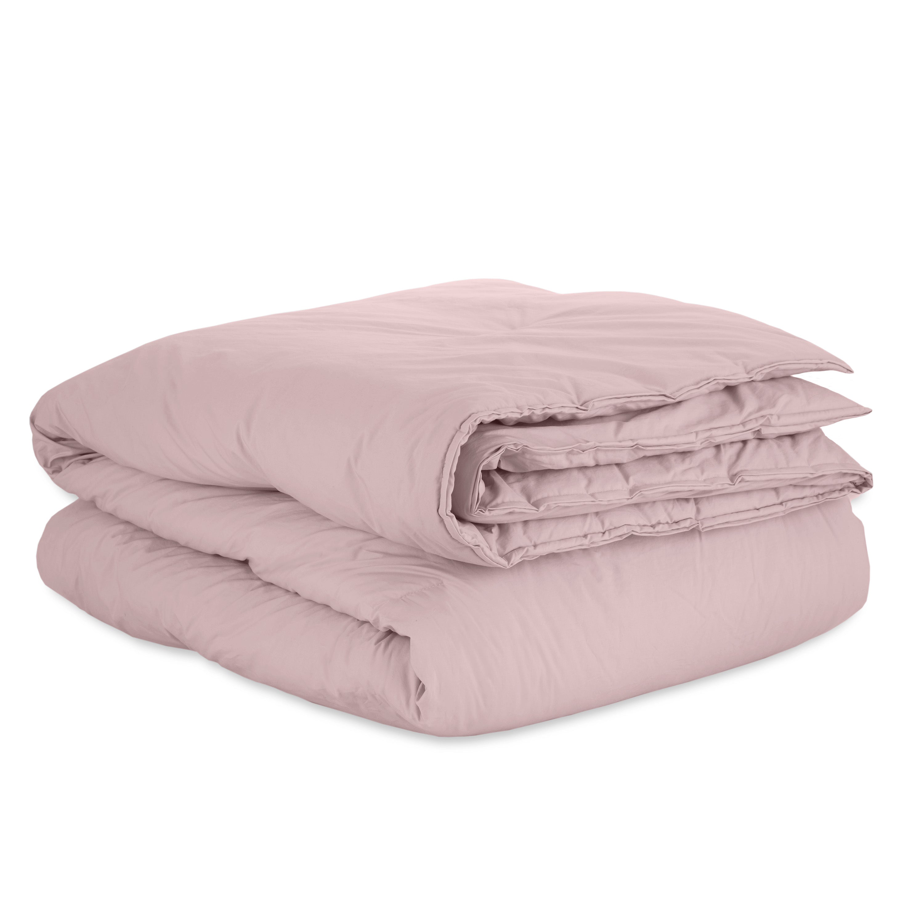 Light pink duvet set folded neatly, featuring a smooth percale texture.