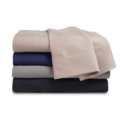 Stack of four brushed microfiber sheets in beige, navy, gray, and black.